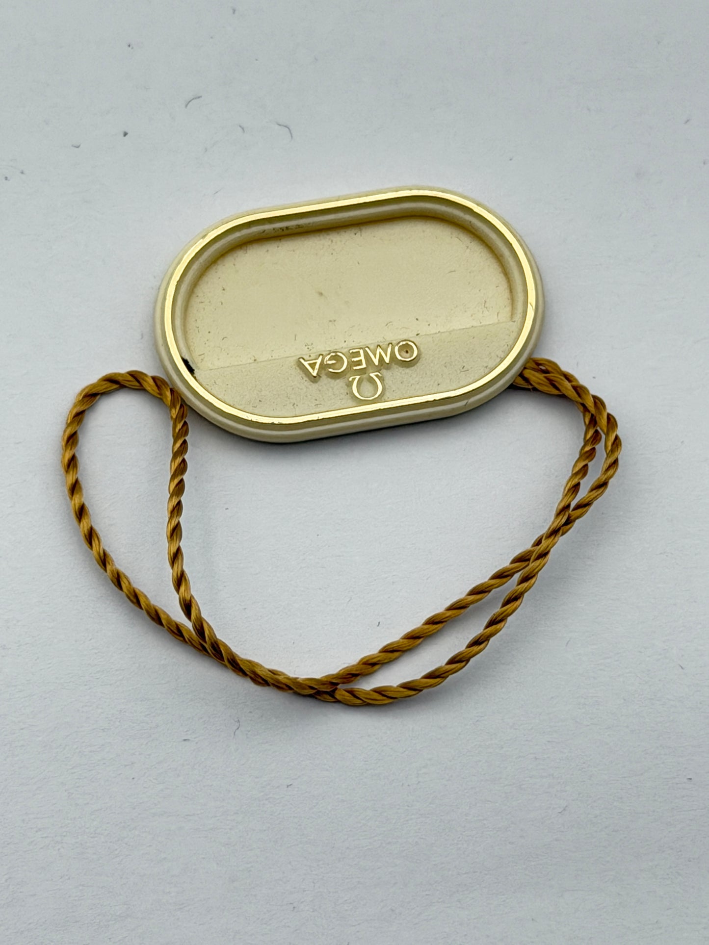 omega 1138 cartellino tag