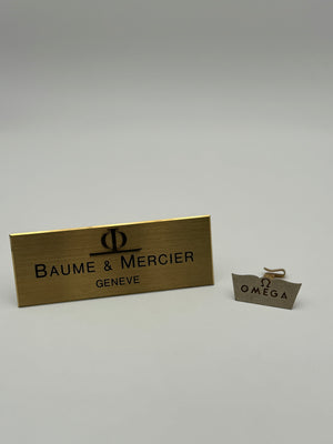 omega swiss made baume e mercier targhe da esposizione