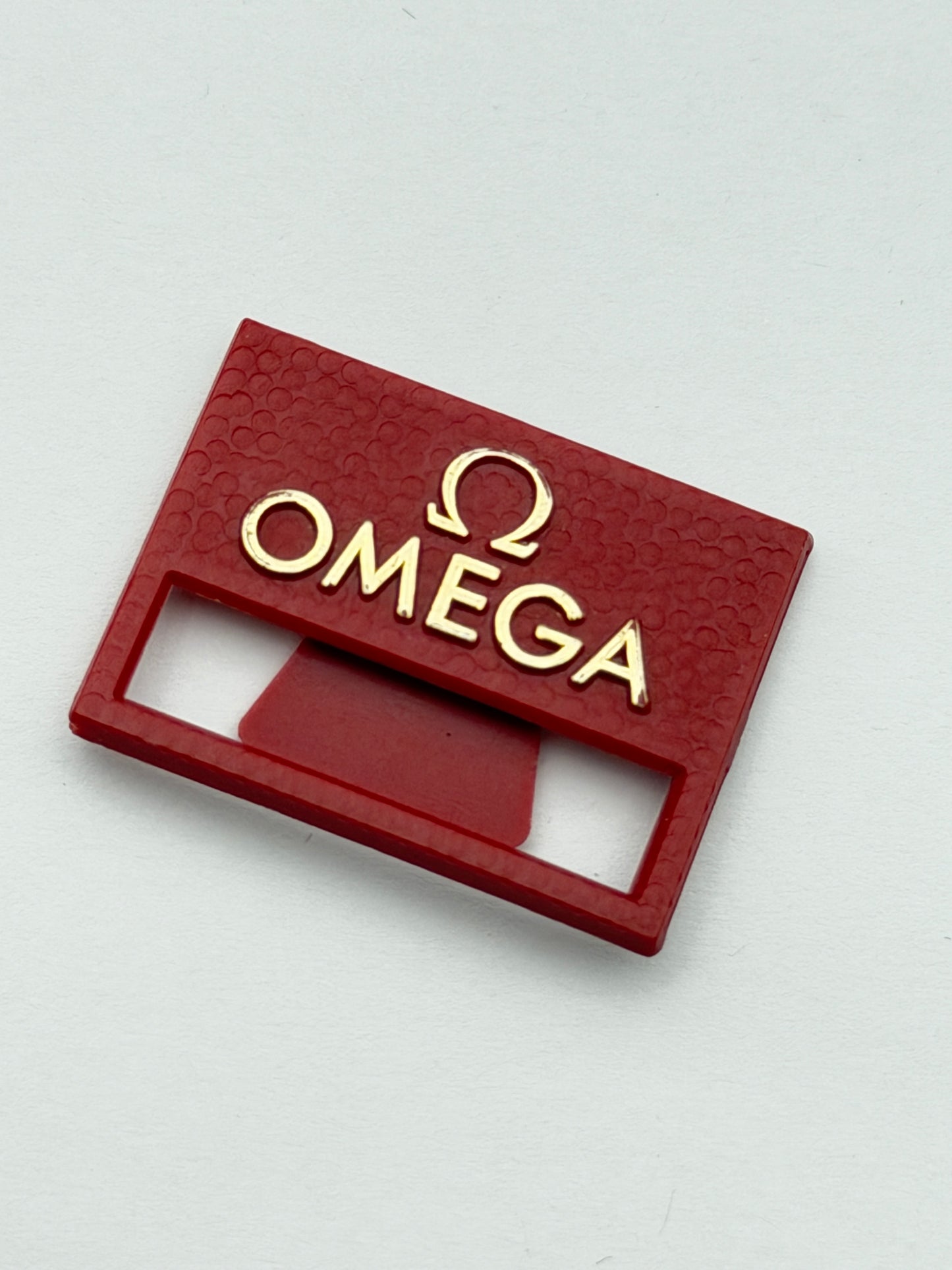 omega tag cartellino vintage