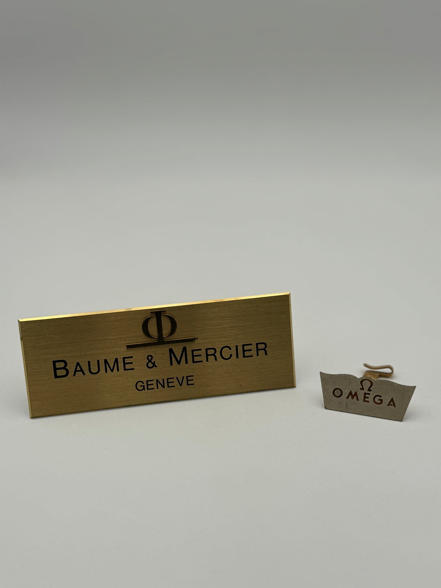 omega swiss made baume e mercier targhe da esposizione